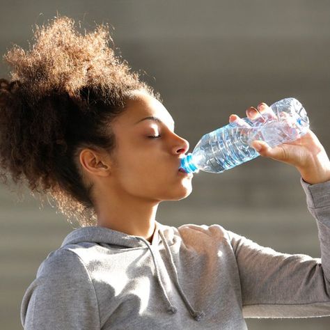 10 Ways Your Body Changes When You Start Drinking Enough Water | Taste of Home Sistem Saraf, Drink More Water, Fad Diets, Lower Blood Sugar, Losing 10 Pounds, Kefir, Healthy Drinks, Drinking Water, Hummus