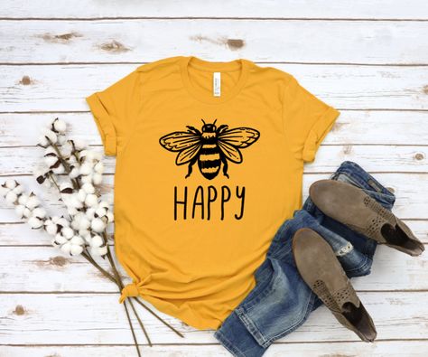 Bee Happy, Women's Tee, Be Happy Shirt, Womens Shirts with Sayings, Mom Tees, Gift for Her, Honey Bee Tee, Shirts for Women, Graphic Tees by BokeyCustoms on Etsy Bee T Shirt, Bee Shirt, Chicken Lover Gifts, Be Kind Shirt, Chicken Shirts, Kindness Matters, Bee Kind, Store Ideas, Dog Lover Shirt