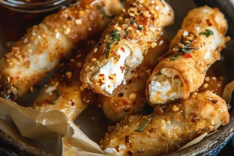 Crispy Oven Fried Feta Rolls with Chili Honey Recipe Flaky Chili Honey Feta Rolls, Feta Rolls With Chili Honey, Fried Feta With Honey, Oven Fried Feta Rolls With Chili Honey, Feta Snacks, Oven Fried Feta Rolls, Fried Feta Rolls, Heavy Snacks, Feta Rolls