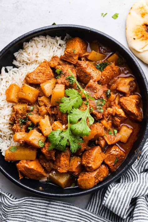 If you’ve never had Chicken Vindaloo, you’re in for a treat! This classic Indian dish is made with chunks of marinated chicken and tender potatoes simmered in a tangy, flavorful, and perfectly spiced broth. Serve over fluffy white rice with Perfect Naan Bread for an irresistible, comforting meal! Instant Pot instructions included! Chicken Vindaloo Recipe, Vindaloo Recipe, Chicken Vindaloo, The Recipe Critic, Recipe Critic, Vindaloo, Chicken Chili Recipe, Butter Chicken Recipe, Naan Bread