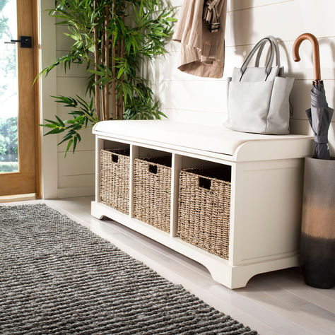 This serene and charming bench is the perfect perch for removing boots in an entryway or garden shoes in the mud room. Bench With Baskets, White Storage Bench, Cubby Storage Bench, Entry Bench, Wicker Storage, White Upholstery, Cubby Storage, White Storage, White Wicker