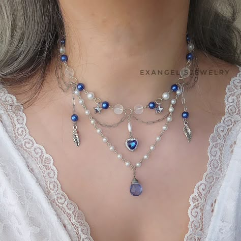 Blue Heart Fairycore Necklace Available in my etsy store Exangelisjewelry.etsy.com Link in Bio ✔️ . . #fairycorenecklace #fairycoregrunge ##fairycore #blueaesthetic #beadednecklace #sparklenecklace #cottagecoreaesthetics #cottagecorenecklace #celestialcorejewelry #summervibes #necklaces #necklacelover #chunkynecklace #fantasyjewelry #magicjewelry #grungegirl #aestheticoutfit #alternativelook #altnecklace Diy Necklace Designs, Fairycore Necklace, Gothic Jewelry Diy, Fairy Jewelry, Sparkle Necklace, Diamond Jewelry Designs, Necklace Ideas, Jewelry Blue, Handmade Wire Jewelry