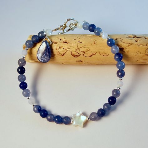 New in my #folksy shop - this dainty bracelet features blue Aventurine beads set with faceted blue Chalcedony, a Kyanite drop charm and a Mother of Pearl star. ✨💙⭐ Shop link in Bio. Kyanite Bracelet, Aventurine Bracelet, Blue Aventurine, Dainty Bracelet, Artisan Gift, Handcrafted Bracelets, Blue Kyanite, Dainty Bracelets, Blue Chalcedony