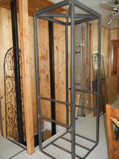 This is how we built our vintage look bird cage elevator. (short version) First we bought a 110 volt electric hoist and secured it to a base in the attic. Attached about 15 feet of 1/4 inch stainless steel cable. One of my husband's clients is a steel fabricator so they work traded... Diy Elevator Lift, Diy Home Elevator, Diy Elevator How To Build, Homemade Elevator, Small Lift In House, Diy Dumbwaiter, Home Lift Elevator Design, Home Elevator Interior, Personal Elevator