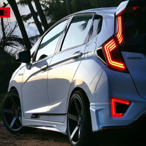 White Honda Jazz on MUGEN full body kit - ModifiedX Honda City Hatchback Modified, Honda Jazz Rs Modified, Honda Jazz Modification, Honda Fit Sport Modified, Mobil Jazz, Honda Jazz Sport, Honda Jazz Modified, Honda Jazz Gk5, Honda Jazz Rs