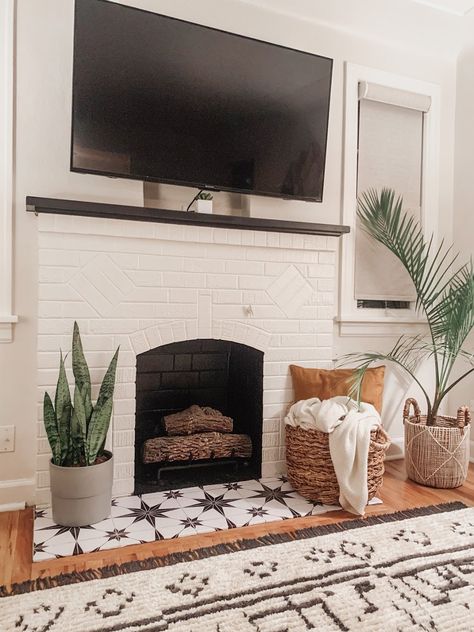 Vinyl Tile Fireplace Surround, Fireplace Rental Makeover, Peel And Stick Floor Tile Fireplace, Peel And Stick White Brick Fireplace, Peel And Stick Vinyl Tile Fireplace, Peel Stick Fireplace Tile, Fireplace Makeover Stick On Tile, Tile Stickers For Fireplace, Peel And Stick Brick Fireplace