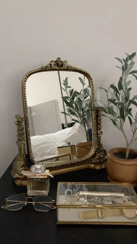 The famous Gold Anthropologie Stand up mirror now comes in a mini vanity size and I’m in love with this home decor #LTKhome #LTKbeauty Vintage Vanity Aesthetic, Spot Light Photoshoot, Cozy Room Ideas, Vanity Aesthetic, Vintage Vanity Decor, Room Ideas For Men, Light Photoshoot, Room Ideas For Men Bedroom, Mirrored Dresser