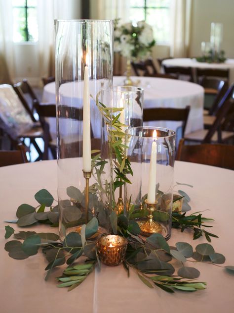 Tapered candles with brass accents and natural greenery around the base | Whim Florals Pretty Wedding Centerpieces, Beautiful Wedding Centerpiece, Candlestick Centerpiece, Flowers Ideas, Flower Centerpieces Wedding, Wedding Table Decorations, Diy Centerpieces, Wedding Table Centerpieces, Rustic Wedding Decor