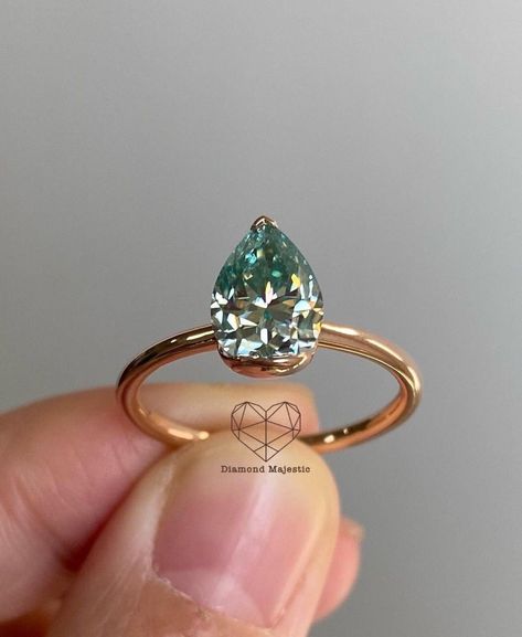 "3.00CT Sapphire Green Pear Cut Moissonite Solitaire Diamond Ring | Solid Gold Ring | Promise Ring Gift for Her | Anniversary Ring For Women. engagement ring, gift for her, ring for her ,rose gold ring, wedding ring, party wear ring, anniversary ring, teardrop ring, promise ring, simple ring, pear stone, valentine's Gift, women day ring gift \"𝐓𝐨𝐠𝐞𝐭𝐡𝐞𝐫 𝐰𝐞 𝐜𝐚𝐧 𝐦𝐚𝐤𝐞 𝐭𝐡𝐞 𝐰𝐨𝐫𝐥𝐝 𝐚 𝐛𝐞𝐭𝐭𝐞𝐫 𝐩𝐥𝐚𝐜𝐞 𝐟𝐨𝐫 𝐥𝐢𝐯𝐢𝐧𝐠, 𝐥𝐞𝐭'𝐬 𝐠𝐨 𝐰𝐢𝐭𝐡 𝐦𝐢𝐧𝐢𝐧𝐠-𝐟𝐫𝐞𝐞 𝐝𝐢 Emerald Green Pear Engagement Ring, Emerald Pear Shaped Engagement Ring, Pear Gemstone Ring, Vintage Teardrop Engagement Ring, Emerald Pear Engagement Ring, Jade Wedding Ring, Emerald Engagement Ring Vintage, Teardrop Engagement Ring, Green Emerald Engagement Ring