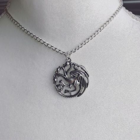 Enola being Lord Otto Hightower youngest and favorite daughter with 1… #fanfiction #Fanfiction #amreading #books #wattpad Game Of Thrones Jewelry Daenerys Targaryen, House Of The Dragon Symbol, House Of The Dragon Necklace, Valyrian Steel Necklace, Targaryen Jewelry Aesthetic, Got Jewelry, House Of The Dragon Clothes Aesthetic, Targaryen Accessories, House Of The Dragon Jewelry