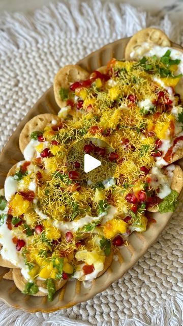 Pranomm on Instagram: "The perfect summer snack thats Quick & Easy, plus so DELICIOUS !   🍋‍🟩🥭Chatpati Mango Papdi Chaat   Ingredients  For the Desi Mango Salsa  1/2 diced Mango  1 chopped green chilli  Juice of 1 lemon  2 tbsp pomegranate  1 tbsp chopped fresh coriander  1/4 chopped sweet yellow pepper 1/4 chopped sweet red pepper  Salt to taste   For Assembling  Around 12-17  papdi /crackers  1/2 cup Whisked curd ( add 1/2 tsp salt, 1/2 tsp jeera powder in it )  1- 1.5 tbsp Saunt (sweet & tangy imili chutney)  1 tbsp green chutney (mint & coriander chutney)  1/4 cup boiled diced potato  1/4 cup sev  Fresh coriander to garnish   Method  In a bowl add all the ingredients for the desired mango salsa & give it a good mix.   Now for assembling our dish, first take a nice platter spread the Papri Chaat Presentation, Chaat Platter, Dahi Papdi Chaat Recipe, Papdi Chaat Recipe, Coriander Chutney, Chaat Recipe, Green Chutney, Vegetarian Snacks Recipes, Pepper Salt