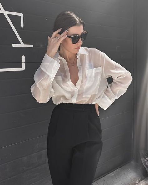 SΔRΔ ΔVΔNS | Minimal Streetstyle on Instagram. Outfit @thefrankieshop. Sheer button down shirt + pleated pants. Black and white minimal outfit. Minimal fashion aesthetic, effortless look. Classy woman. Sophisticated lady. Sheer White Shirt Outfit, White Shirt Outfit, Sheer White Shirt, Black Shirt Outfits, Sheer Black Shirt, Outfit Minimal, Sophisticated Lady, White Shirt Outfits, White Minimal