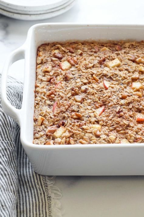 Filled with chewy oats, tender apple chunks, warm cinnamon, and toasted walnuts this Apple Cinnamon Baked Oatmeal is a delicious breakfast for kids and adults alike. Baked Oatmeal With Apples, Baked Oatmeal Recipes Breakfast, Oatmeal With Apples, Apple Cinnamon Baked Oatmeal, Cinnamon Baked Oatmeal, Baked Apple Oatmeal, Baked Oatmeal Healthy, Real Food Dietitians, Paleo Muffins