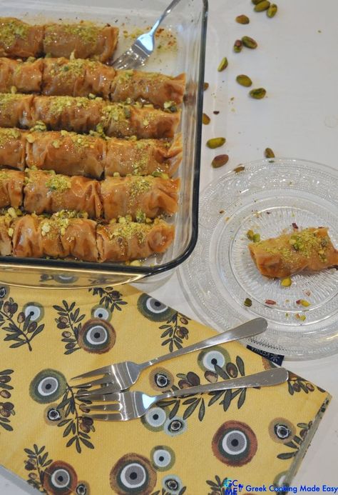 Saragli or Saraglakia are traditional sweets shaped like rolls instead of layered. Α mouthwatering combination of golden phyllo wrapped around delicious Greek pistachio nuts and a light, aromatic syrup. A supreme must-try sweet.
#saragli #baklavarolls #σαραγλι #greekcooking #therecipeoftheday #syntaghthshmeras #keepcooking #greece #greek #delicious #συνταγες #greekcookingmadeeasy #greekcuisine  #lovetocook #greekyoutuber #greekdiet #σιροπιαστό #greekblogger #foodinspiration  #likemygrandma Greek Pistachio, Greek Christmas Recipes, Greek Easter Recipes, Baklava Rolls, Greek Diet, Greek Christmas, Pistachio Baklava, Traditional Sweets, Greek Easter