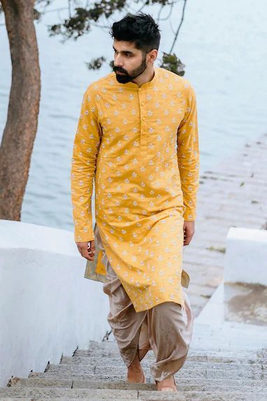 Dakshina Ceremony Looks For Both The Bride And Groom Dhoti Design For Men, Male Haldi Outfits, Dhoti Kurta For Men Indian Weddings, Trendy Haldi Outfits, Dhoti Kurta For Men, Haldi Outfit Ideas, Dhoti Pants For Men, Men Dresses, Haldi Ceremony Outfit