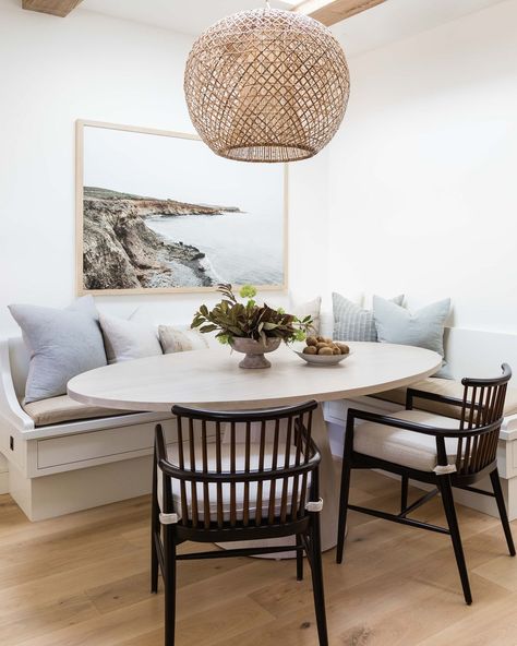 Pure Salt Interiors on Instagram: “A breezy breakfast nook that's got us daydreaming of sea air and sandy toes ☺ This coastal inspired banquette really feels like you are…” Pure Salt Interiors, Coastal Dining Room, Kitchen Banquette, Pure Salt, Coastal Dining, Rooms Ideas, Rattan Pendant Light, Up House, Kitchen Nook