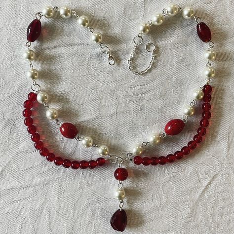 pearl and red glass bead necklace with loops and pendant Goth Indie Aesthetic, Gothic Items, Baby Cartoon Characters, Pearl Bead Necklace, Braided Bracelet Diy, Diy Fashion Clothing, Indie Aesthetic, Fancy Jewellery, Jewelry Inspo