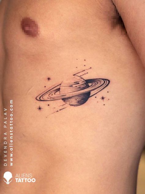 Creative and Unique Small/Cute Tattoo Ideas | Aliens Tattoo Small Space Tattoo Ideas For Men, Unique Saturn Tattoo, Minimalistic Tattoo Ideas For Men, Tattoo Ideas Minimalist Men, Planet Hand Tattoo, Mini Saturn Tattoo, Minimal Men Tattoo, Small Minimalist Tattoo Men, Minimal Space Tattoo