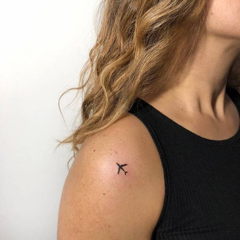 Minimalist airplane tattoo on the shoulder Small Hip Tattoos Women, Tattoo On The Shoulder, Airplane Tattoo, Plane Tattoo, Cute Simple Tattoos, Basic Tattoos, Airplane Tattoos, One Tattoo, Henna Inspired Tattoos