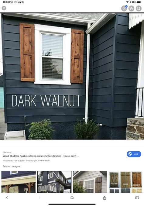 Gray Siding With Wood Shutters, Dark Grey House Wood Shutters, Navy House Black Shutters, Black House Wood Shutters, Black House Wooden Shutters, Black House With Wood Shutters, Blue And Grey House Exterior, Midnight Blue House Exterior, Charcoal Grey House Exterior