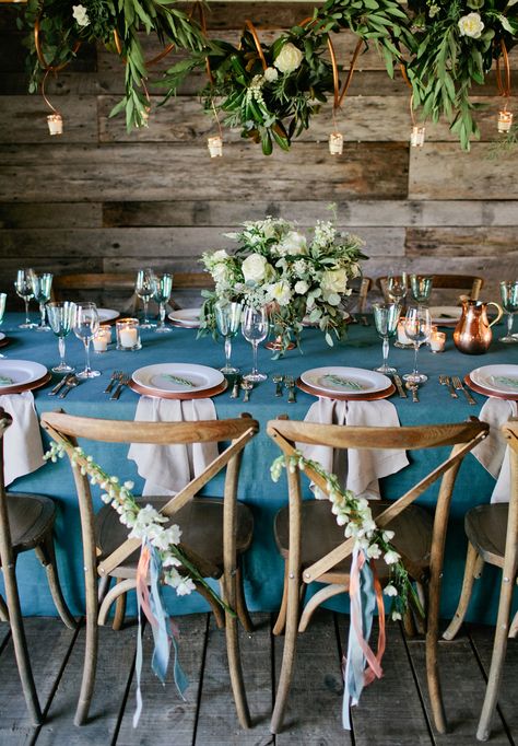 Teal Table Cloth Wedding, Teal And Beige Wedding Theme, Teal Table Cloth, Teal Table Decor, Rustic Chair Decor, Flower Chandelier Wedding, Bridal Shower Planning Checklist, Chandelier Wedding Decor, Industrial Modern Wedding