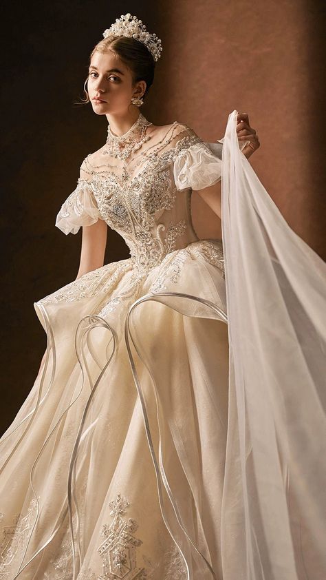 Look like royalty on your big day in this Vintage Inspired Luxury Princess Beading Wedding Dress With Open Back- Plus Size! Wow your guests when you walk down the aisle with its dazzling vintage-inspired beading and stunning open back. There's no doubt you'll be the most beautiful bride! Ahh-mazing!!! Fantady Wedding Dress, Regal Wedding Dress Romantic, Big Sleeved Wedding Dress, Antique White Wedding Dress, Fantastical Wedding Dress, Armour Wedding Dress, Fairy Tale Wedding Dress Fantasy Gowns, Victorian Themed Wedding Dress, Imperial Wedding Dress