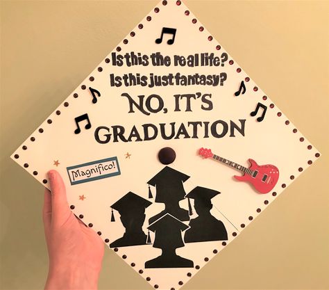 Rock your graduation ceremony with this Queen-themed cap design! This was an original idea inspired by the famous Queen song "Bohemian Rhapsody." The graduate silhouettes are supposed to look like the band members in the BoRhap music video :) I also outlined this cap in red rhinestones to match the guitar sticker. As for the fonts I used, I selected Impact and Cinzel Decorative. Hope this design inspires you! Music Theme Graduation Cap, Music Inspired Graduation Caps, Rock Music Graduation Cap, Rock Graduation Cap, Band Graduation Cap, Queen Graduation Cap, Graduation Cap Designs Music, Music Graduation Cap, Senior Diy