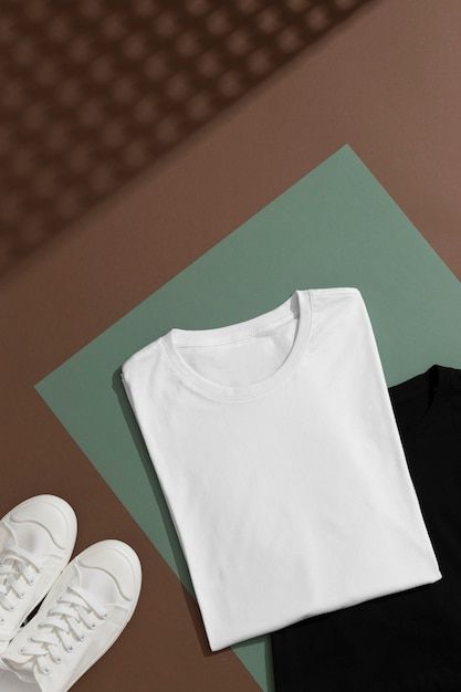 Premium Photo | Shirt mockup concept with plain clothing Plain Clothing, Plain White T Shirt, Fabric Pictures, Plain Tshirt, Hijab Tutorial, Shirt Mockup, Premium Photo, Free Photo, Free Photos