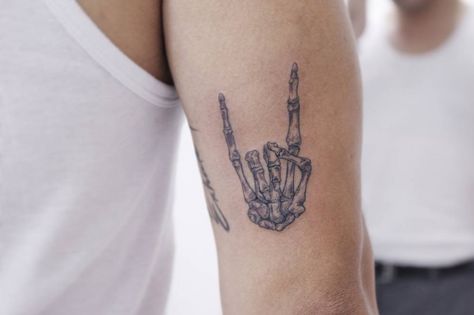 Rock And Roll Tattoo, Hand Tattoo Images, Skull Hand Tattoo, Rock Tattoo, Skeleton Tattoos, Skeleton Hand Tattoo, Rock Hand, Sternum Tattoo, Small Hand Tattoos