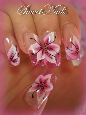 25 Delicate Flower Nail Designs Adding Lovely Blooms To Your Fingertips! Lily Flower Nail Art, Hand Painted Flower Nails, Lilly Nail Art, Lily Flower Nails, Lily Nail Art, Lilly Nails, Tropical Nail Art, Lily Nails, Unghie Nail Art