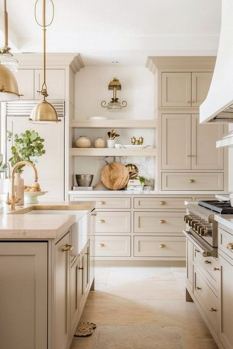 Tan Cabinet Kitchen, Light Cream Cabinets Kitchen, Greige And White Oak Kitchen, Beige Cabinets With Gold Hardware, Kitchen With Blonde Floors, Beige Cabinet Kitchen, Creamy Cabinet Colors, Beige Lower Cabinets White Upper, Ivory Brown Kitchen Cabinets