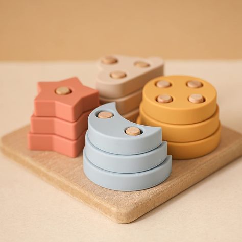 PRICES MAY VARY. SILICONE STACKING TOYS: This Silicone sorting and stacking toy incorporates elements from the sky, such as stars, clouds, the moon, and the sun, available in four vibrant colors: red, yellow, blue, and white. Tailored for children aged 1, 2, 3 years old, it serves as an exceptional educational tool, fostering shape pattern recognition, color identification, and spatial understanding. Babies can enjoy engaging play while learning to match blocks to targets or exploring various co Preschool Fine Motor Skills, Diy Montessori Toys, Sorting & Stacking Toys, Montessori Color, Stacker Toy, Preschool Fine Motor, Smart Toys, Puzzles For Toddlers, Stacking Toys