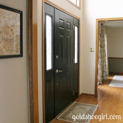 Black door with oak trim Black Door With Wood Trim, Black Doors Wood Trim, Black Doors With Wood Trim, Interior Front Door Black, Interior Front Door Color Entryway, Painted Interior Front Door, Interior Front Door Color, Black Front Door Interior, Black Interior Front Door