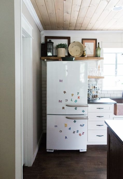 What Your Fridge Decor Reveals About Who You Really Are — Happy at Home | The Kitchn Open Shelving Over Fridge, Shelving Above Fridge Open, Above Refrigerator Storage Open Shelves, Open Shelves Above Refrigerator, Shelves Above Refrigerator Ideas, Open Shelves Over Refrigerator, Open Shelf Over Fridge, Above Fridge Ideas Open Shelves, Awkward Space Above Fridge