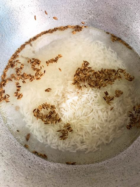 Three ingredient authentic and easy fluffy jeera (cumin) rice with the perfect texture. Dry and all grains separated, lets learn how to cook basmati rice. #recipes #basmati #basic #recipe #stove #top #kitchen #punjabi #north #indian #asian #white Cumin Rice Recipe, Cumin Rice, Rajma Recipe, Basmati Rice Recipes, Curry Pasta, Cooking Basmati Rice, Malai Kofta, Indian Rice Recipes, Indian Diet