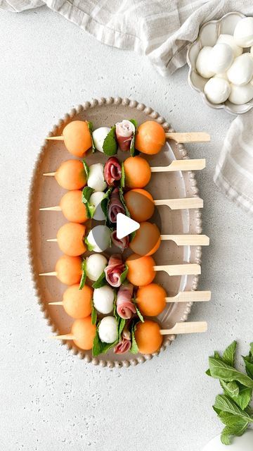 Kristel Talie on Instagram: "Prosciutto and Melon Skewers🍈🍡

A fun appetizer to bring to any summer party! It’s also healthy, refreshing and delicious😋

You’ll need

Cantaloupe 
Fresh mint leaves
Prosciutto slices
Bocconcini
Salt
Balsamic glaze

1- To form the cantaloupe balls, I used a melon baller. If you don’t have one, simply cut them into cubes instead, they will still look gorgeous!

2- For the prosciutto flowers, cut one prosciutto slice in half, fold and tightly roll.

3- Assemble and enjoy!✨

#summerfood #partysnacks #melon #cantaloupe #funfood #fingerfood #italianfood" Melon Appetizer, Melon And Proscuitto, Melon Skewers, Cantaloupe Balls, Toothpick Appetizers, Appetizer Display, Fruit Appetizers, Food On Sticks, Melon Baller