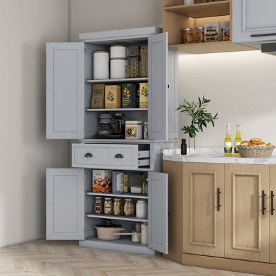 Ample Space: The freestanding pantry has large space with a deep, easy-gliding drawer and two large cabinets with magnetic closure doors, making it suitable for storing various household items such as silverware, knick-knacks, towels, cookware, etc. | Red Barrel Studio 72" Kitchen Pantry Storage Cabinet, Manufactured Wood | C111163379_512646352 | Wayfair Canada