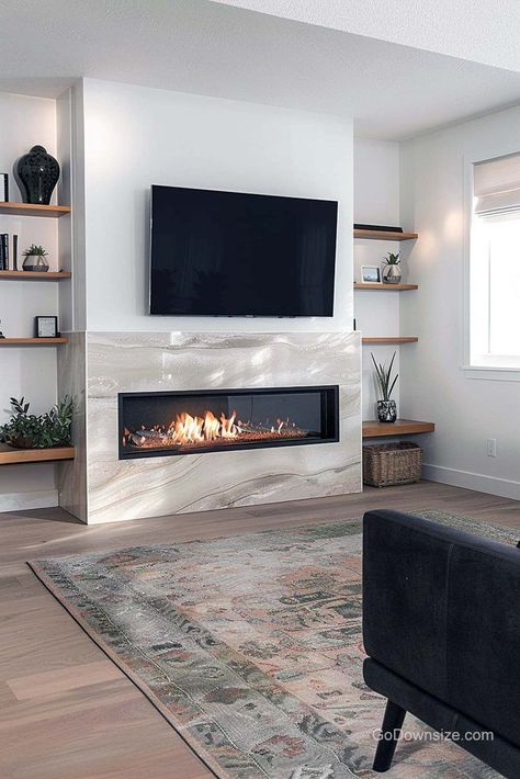 This electric fireplace shines with a gorgeous tiled surround under the TV. It doesn’t stop there, you also get clever storage on the sides. Tv Unit Table, Modern Fireplace Ideas Living Rooms, Living Room Design Boho, Built In Electric Fireplace, Inviting Bedroom, Dream House Living Room, Living Room Built Ins, Gas Fireplaces, Electric Fireplaces