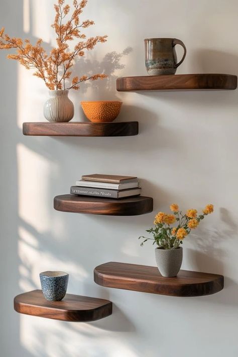 Elevate your home’s aesthetic with DIY floating shelves! These simple, stylish shelves are perfect for a minimalist look and functional storage. 🏡✨ #DIYFloatingShelves #MinimalistDecor #HomeOrganization #SimpleLiving #DIYHomeProjects Small Floating Shelves Living Room, Elvis House, Stylish Shelves, Floating Shelves Modern, Diy Floating Shelves, Floating Shelves Living Room, Minimalist Shelves, Minimalist Space, Floating Shelves Diy