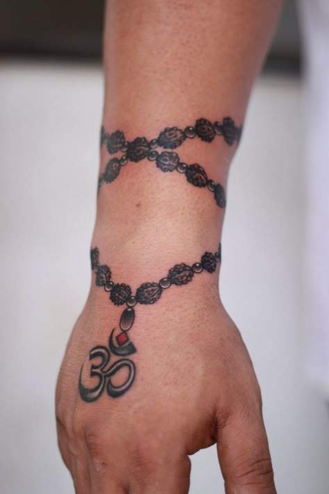 Rudraksh Tattoo Design, Rudraksha Tattoo Design, Swastik Design Tattoo, Indian God Tattoo, Rudraksha Tattoo, Rudraksh Tattoo, Henna Arm Tattoo, Hindi Tattoo, Bracelet Tattoo For Man