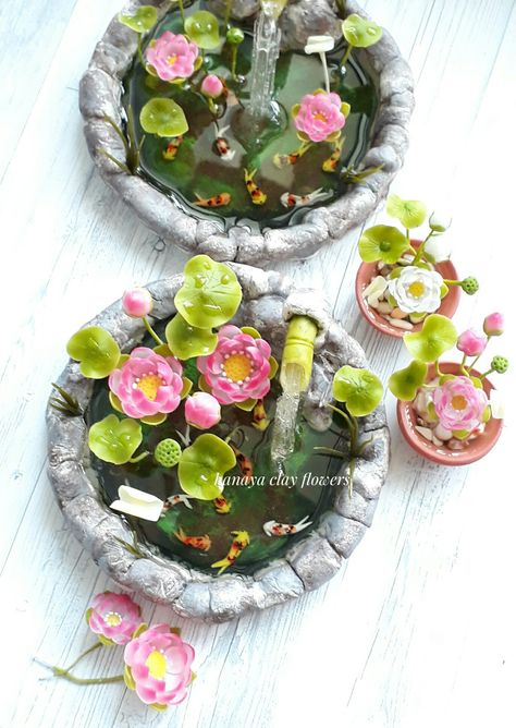 Lotus and fish Koi pond, made with air dry clay Air Dry Clay Lotus Flower, Air Dry Clay Lily Pad, Flower Clay Ideas, Air Dry Clay Miniatures, Clay Competition, Clay Pond, Clay Lotus, Clay Box, Teacup Gardens