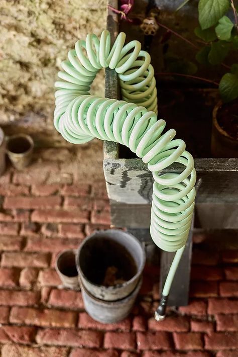 coiled hose Watering Cans, Garden Hoses, Outdoor Rugs Patio, Spring Easter Decor, Patio Rugs, Water Hose, Hand Poured Candle, Garden Structures, Garden Accessories