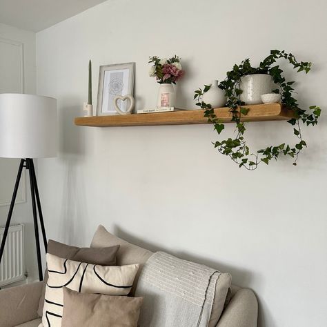 Discover the beauty of simplicity with our wooden floating shelf perfectly styled for your living room, shown here by @homebyholli 🌿 📸 #minimalistdecor #bensimpsonfurniture #floatingshelf #floatingshelves #rusticcharm Floating Shelves Living Room Decor, Shelves Above Sofa, Wooden Floating Shelf, Cute Bookshelves, Kitchen Living Room Ideas, Long Floating Shelves, Floating Shelves Living Room, Shelf Decor Living Room, Shelves Living Room