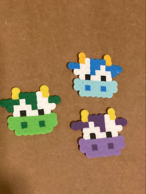 blue cow purple cow green cow perler bead cute pixel art farm animal perler beads Bead Art Animals, Perler Beads Cows, Cow Melty Beads, Pearler Bead Patterns Cow, Blueberry Perler Beads, Green Perler Bead Ideas, Simple Small Perler Bead Patterns, Matching Pearler Beads, Cow Bead Pattern