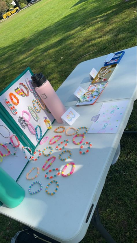 Bracelet Stall Ideas, Bracelets Pop Up Shop, Bracelet Stand Ideas Outside, Preppy Bracelet Pop Up Stand, Bracelet Stall, Festival Bracelets Display, Bracelet Stand Ideas, Bracelet Pop Up Stand, Pop Up Stand