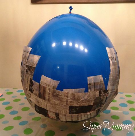 How to Make A Paper Mache Pinata How To Paper Mache A Balloon, Paper Mache Basketball, Pinata Making, Paper Mache Pinata, Monster Pinata, Homemade Pinata, Diy Paper Mache, Pinata Diy, Kids Cabinet