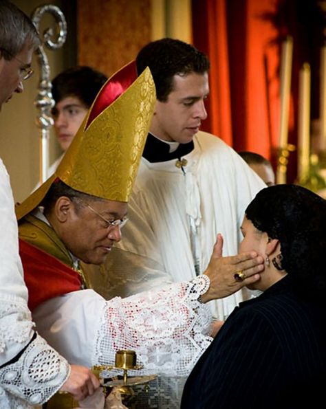 it is a picture of a person receiving the sacrament of confirmation. Normally it is done by a local bishop or archbishop. Sacrament Of Confirmation, Picture Of A Person, Catholic Sacraments, Adult Baptism, Dove Images, Latin Mass, King Photo, Christ The King, High School English