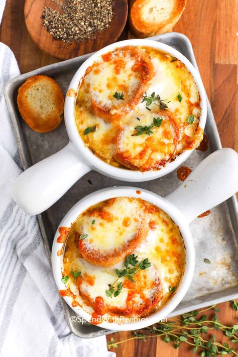 This classic French Onion Soup recipe is bound to become a favorite. It features two types of melted cheese and can be enjoyed with croutons or toasted slices of French bread. It's easy to prepare and boasts high-quality ingredients like wine and savory seasonings. This hearty and gourmet-style soup is a guaranteed hit for any dinner occasion. #frenchonionsoup #soup #homemade #spendwithpennies The Best French Onion Soup, Homemade French Onion Soup, Best French Onion Soup, Classic French Onion Soup, Onion Soup Recipe, Soup Homemade, Ceramic Crock, French Onion Soup Recipe, Spend With Pennies