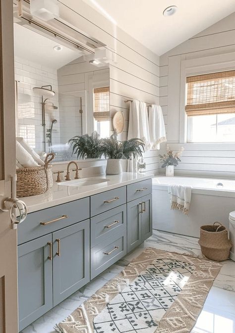 27 Beautiful and Soothing Coastal Bathroom Ideas 70 27 Beautiful and Soothing Coastal Bathroom Ideas Coastal Interiors Design Bathroom, Blue And Ivory Bathroom, White Grey Blue Bathroom, Coastal Grandma Bathroom Ideas, Charleston Bathroom Ideas, Belgian Design Interiors, Lakehouse Bathroom Decor, Dream Guest Bathroom, Master Bath Remodel Blue