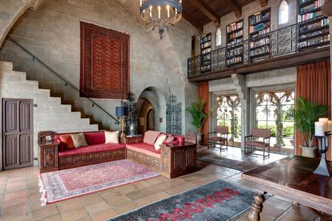 This Mediterranean-style home in Berkeley Hills, nicknamed "Hume Castle," is reminiscent of a 13th century French castle. It features gothic arches and medieval elements such as vaulted ceilings, spiral staircases, heavy wooden beams and stunning wrought-iron chandeliers. Medieval Apartment, Modern Castle, Mediterranean Style Home, Famous Castles, French Castles, Wrought Iron Chandeliers, The Cloisters, Iron Chandeliers, Most Beautiful Cities